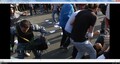 Троерина хватает сзади парень в сером